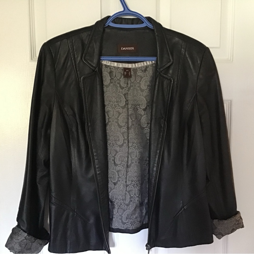 Danier leather jacket . Black.
